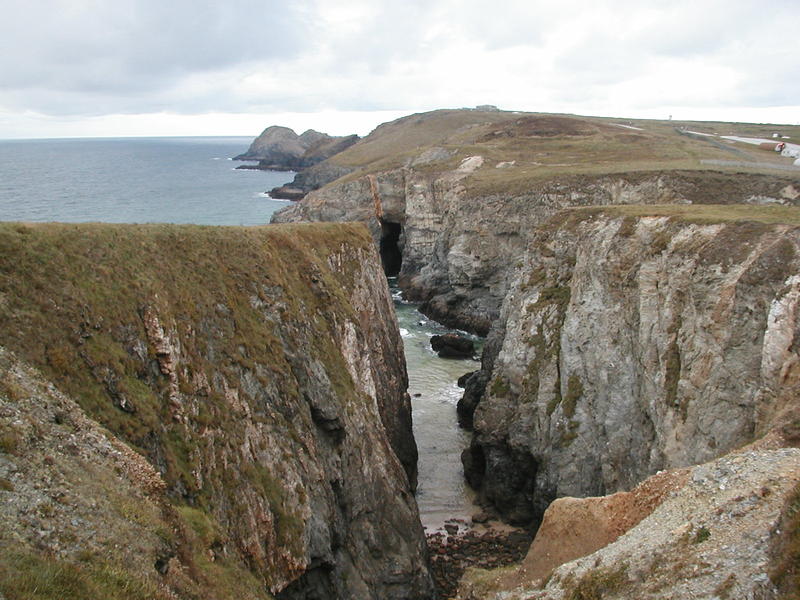 Light grey sea cliffs stretching off into the distance.